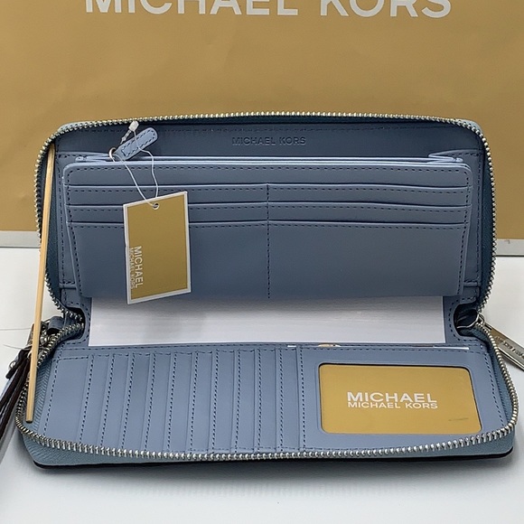 MICHAEL KORS LARGE TRAVEL
CONTINENTAL WRISTLET WALLET PALE
Blue COLOR - Picture 3 of 11